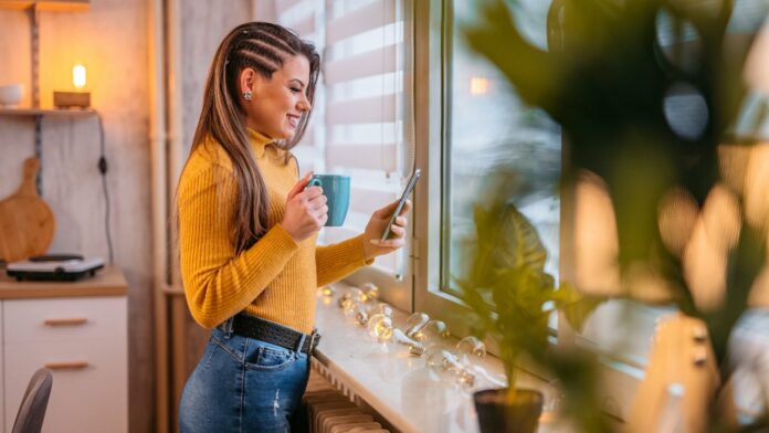 pretty lady smiling at phone