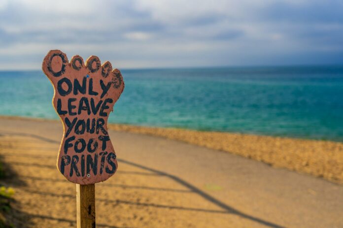 foot print sign at beach